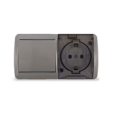Блок (K2237-Gr) (1кл выключатель + 1-ая розетка  с прозрачной крышкой 16А з/к ) серый  о/у "КЛИО" УНИВЕРСАЛ IP54