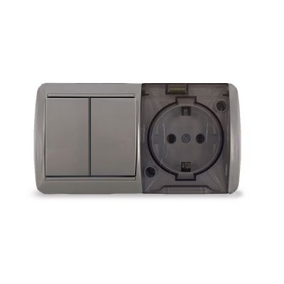 Блок (K2239-Gr) (2кл выключатель + 1-ая розетка  с прозрачной крышкой 16А з/к ) серый  о/у "КЛИО" УНИВЕРСАЛ IP54